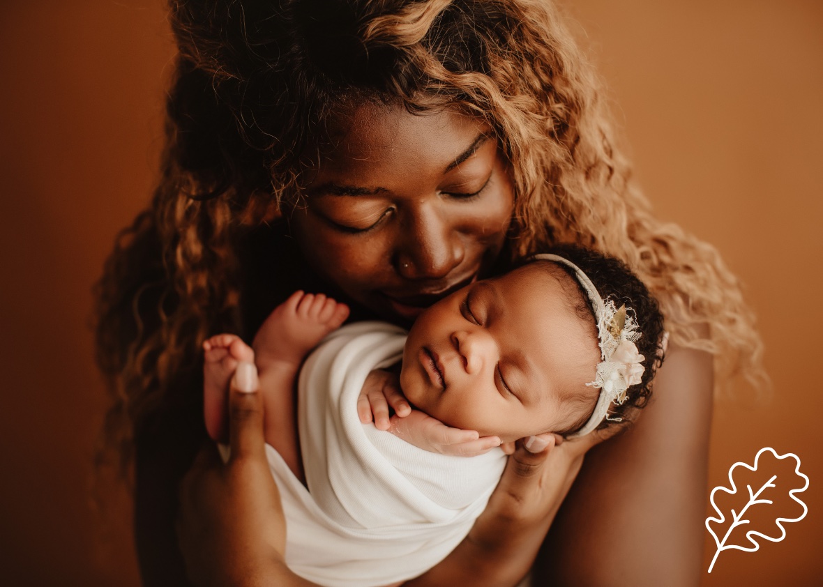 Mother embracing her baby